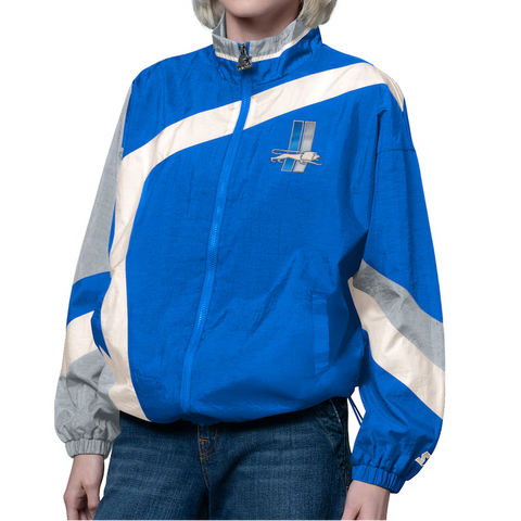 Woman wearing a blue and white jacket with a logo on a white background